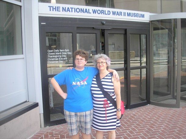 With John in front of the National World War II Museum, New Orleans. Photo by Jim Kilfoyle.